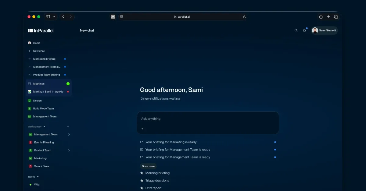 The In Parallel home screen: a greeting, an ask-anything box, and three briefings already waiting to be read — one for Marketing, two for the Management Team — above starred shortcuts for a morning briefing, triage and a drift report.